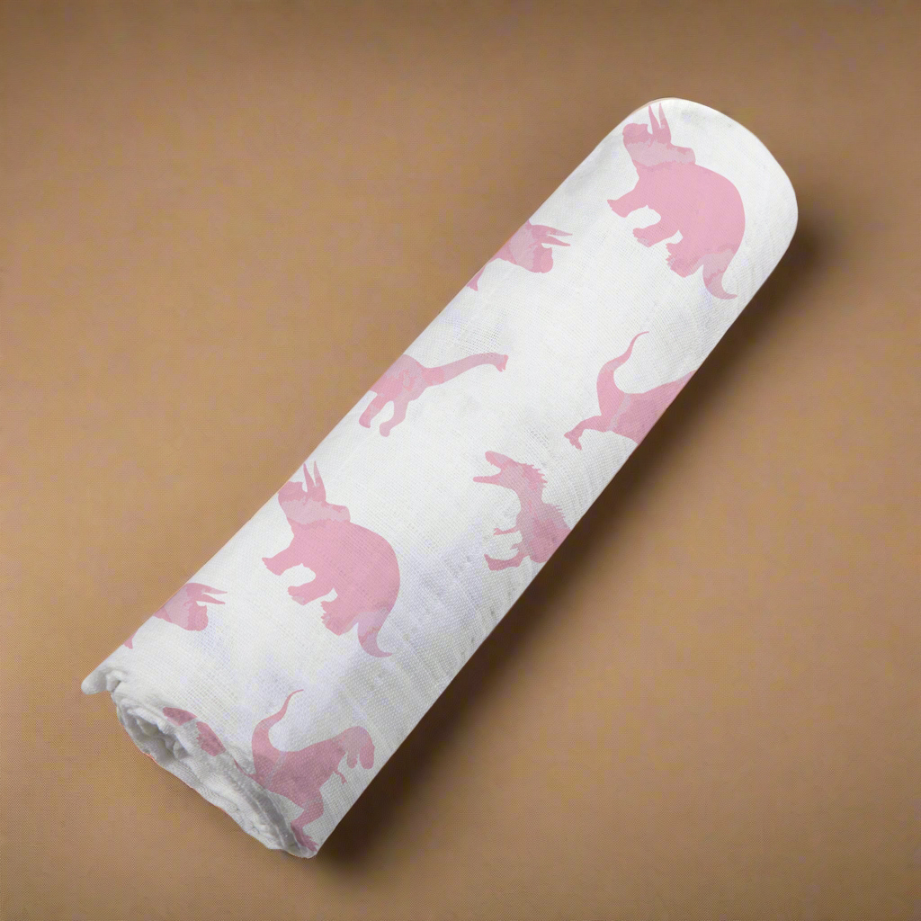 Pink Dinosaurs Bamboo Muslin Swaddle