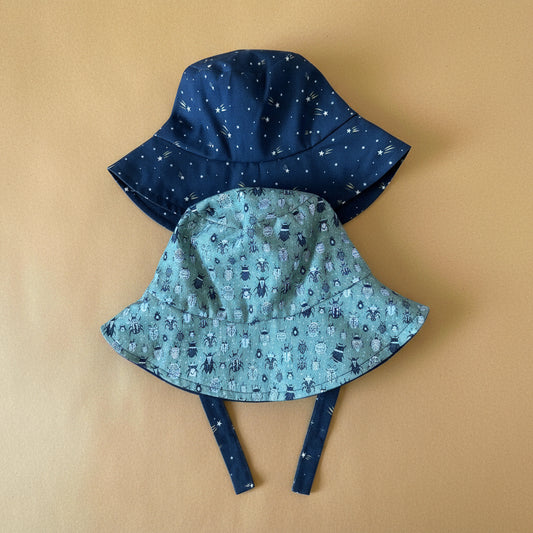 Bucket hat in Organic Scarab